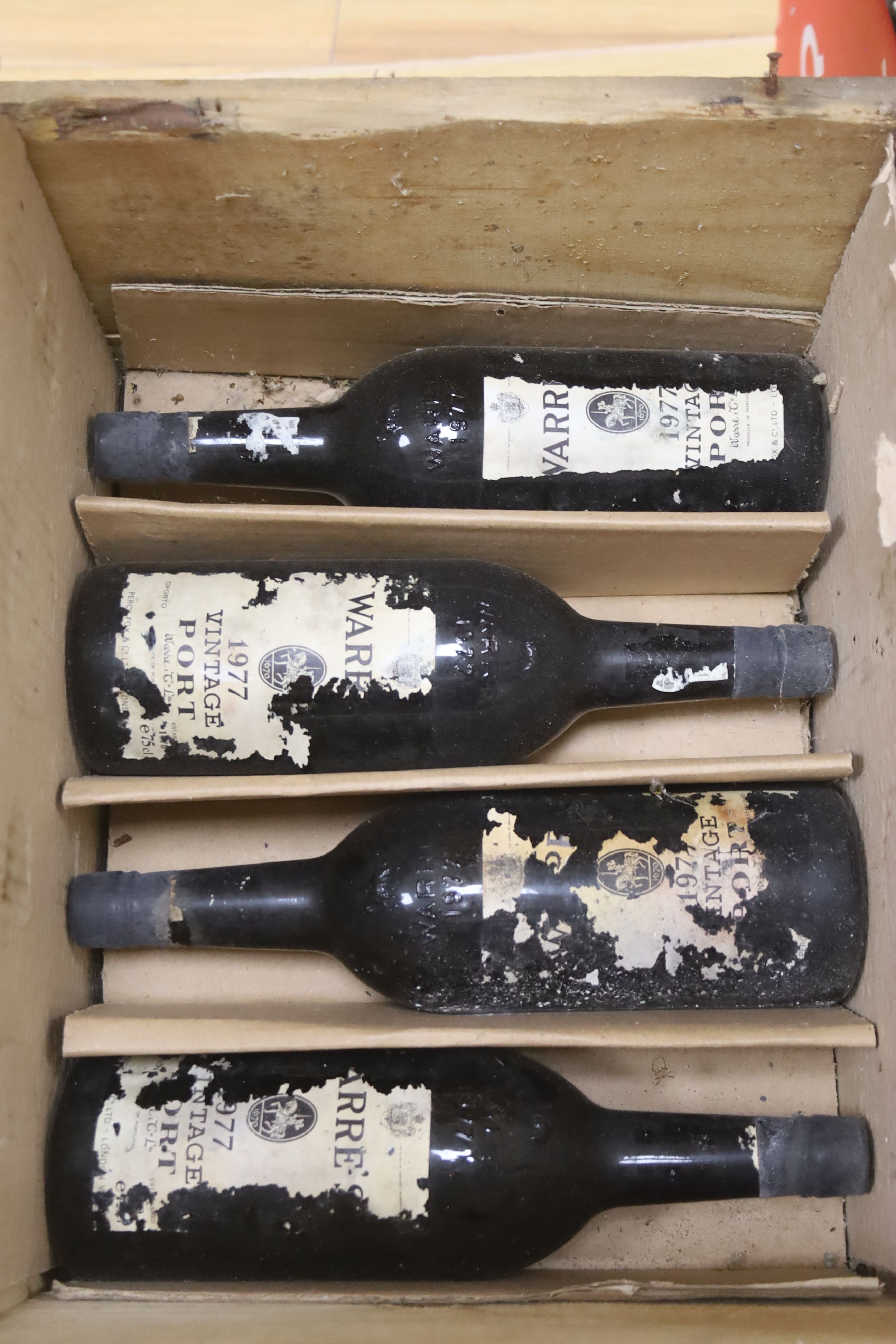 Eight bottles of Warres 1977 Vintage Port.